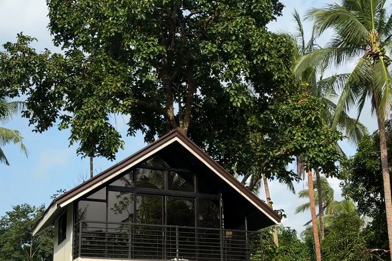 A-Frame Villa glass facade at golden hour